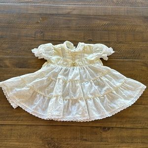 Vintage Polly Flinders baby smocked dress yellow and white. Size 3-9 months